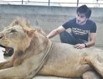 Imran Abbas responds to animal abuse criticism after posing with a lion