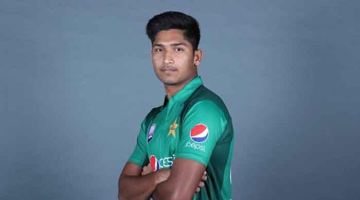 Pakistan fast bowler Mohammad Hasnain on Saturday became the youngest bowler in cricket history to claim a T20I hat trick. The 19-year-old pacer achieved the feat against Sri Lanka in the first of the three-match T20I series against Sri Lanka. He picked up a wicket on the final ball of the 16th over and two more on the first two balls of the 19th over. The disconnect between the first and other two wickets meant that his feat was largely lost on the crowd and even the commentary team. It was only after he had completed his hat-trick, it dawned that he has three in three balls. Hasnain finished with figures of 3-37 in his four overs. Although he was wayward at the start, he came back strong and made his wicket-taking ability erase most of what had happened earlier.